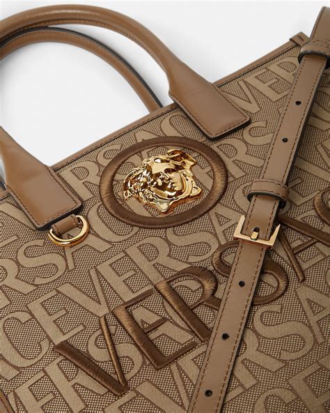 are versace small bags made with different logo|Versace bags clearance.